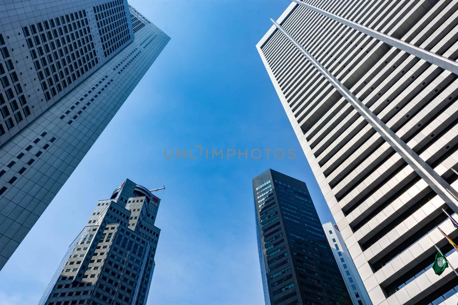 SINGAPORE - MAR 30: View of skyscrapers in Marina Bay on March 30, 2020 in Singapore. Singapore is the world's fourth leading financial centre.  UOB Building and One Raffles place