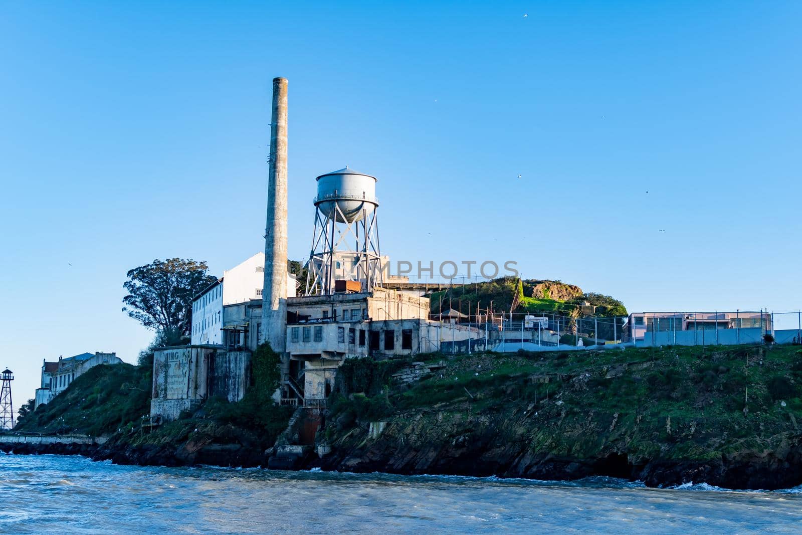 Power plant, Water Tower and the Storehouse warehouse at Alcatraz Island Prison, San Francisco California USA, March 30, 2020