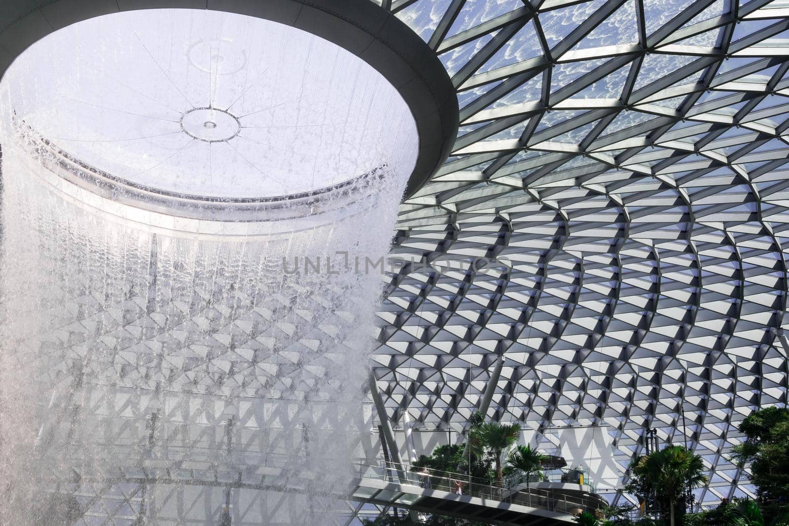 Singapore,Singapore - December 28, 2019 : Jewel Changi Aiport at night which connecting to Terminal 1 Arrival and Terminal 2,3 through linked bridge