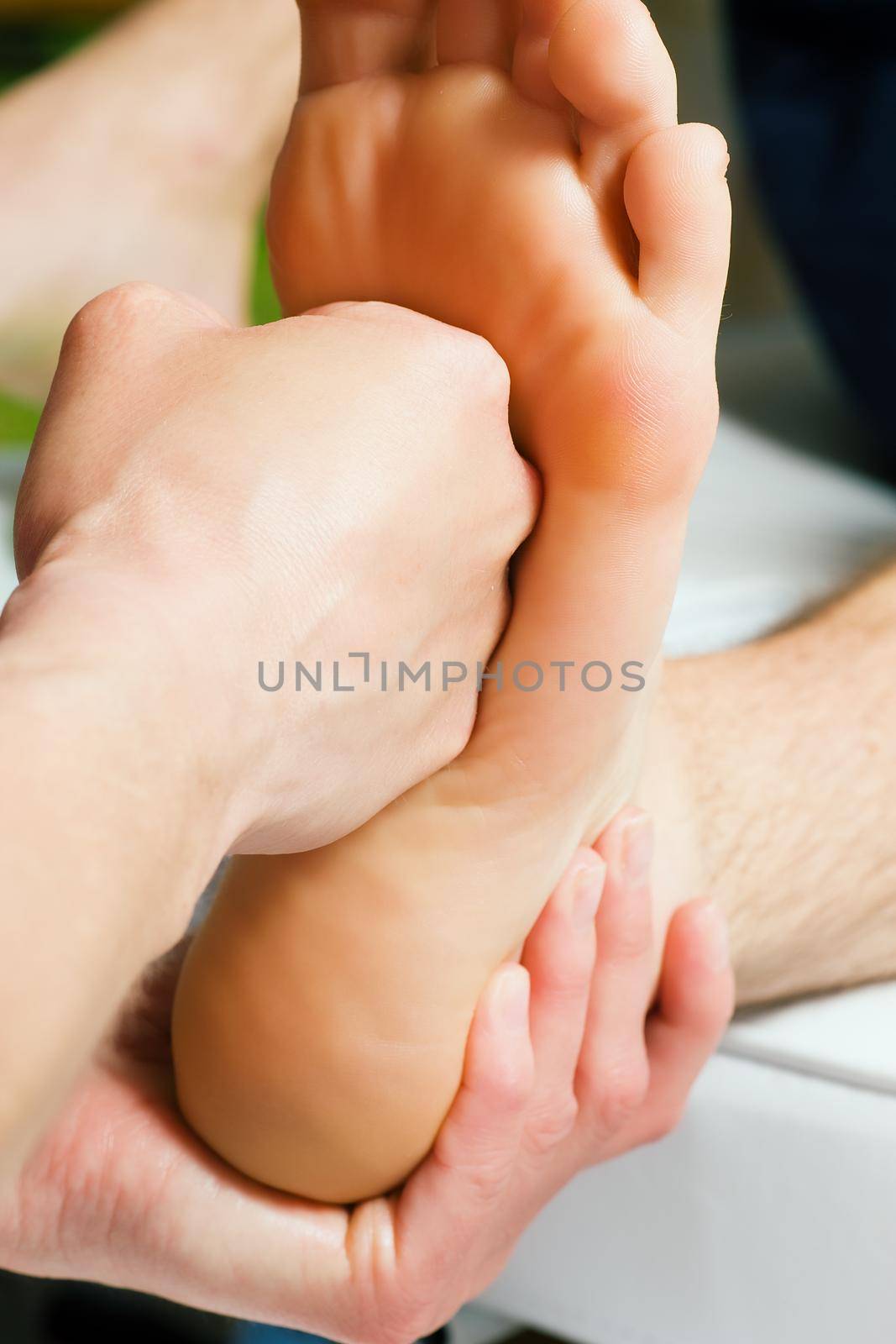 Foot massage with fist by Kzenon