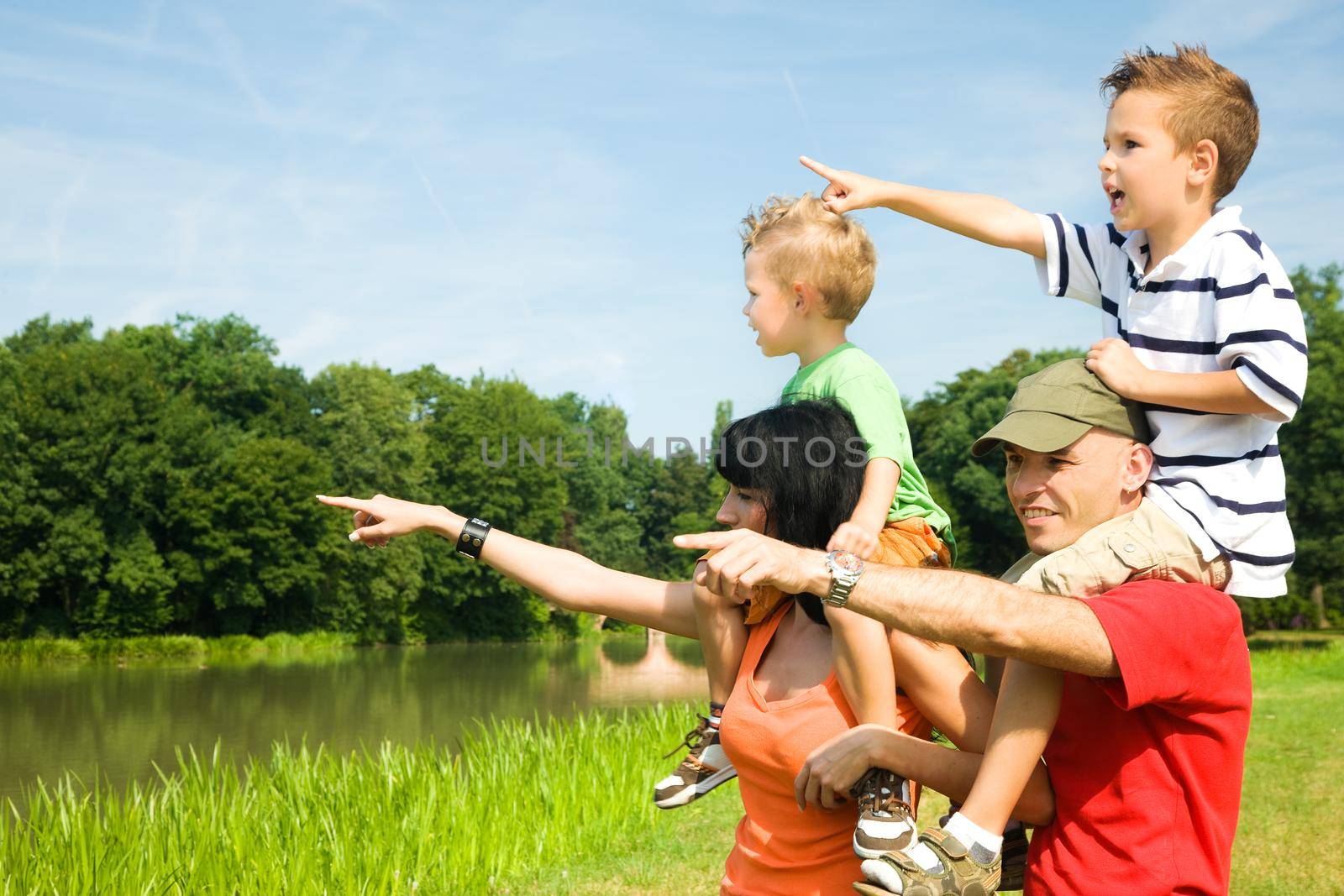 Family with two kids on vacation having a sightseeing trip