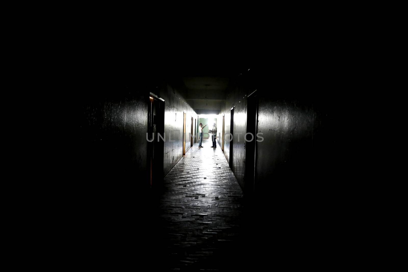 alagoinhas, bahia / brazil - july 3, 2019: internal view of the Public Library in the city of Alagoinhas. The dark place due to power outage.