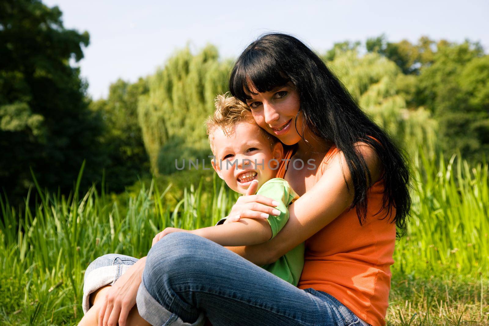Mother and son outdoors by Kzenon