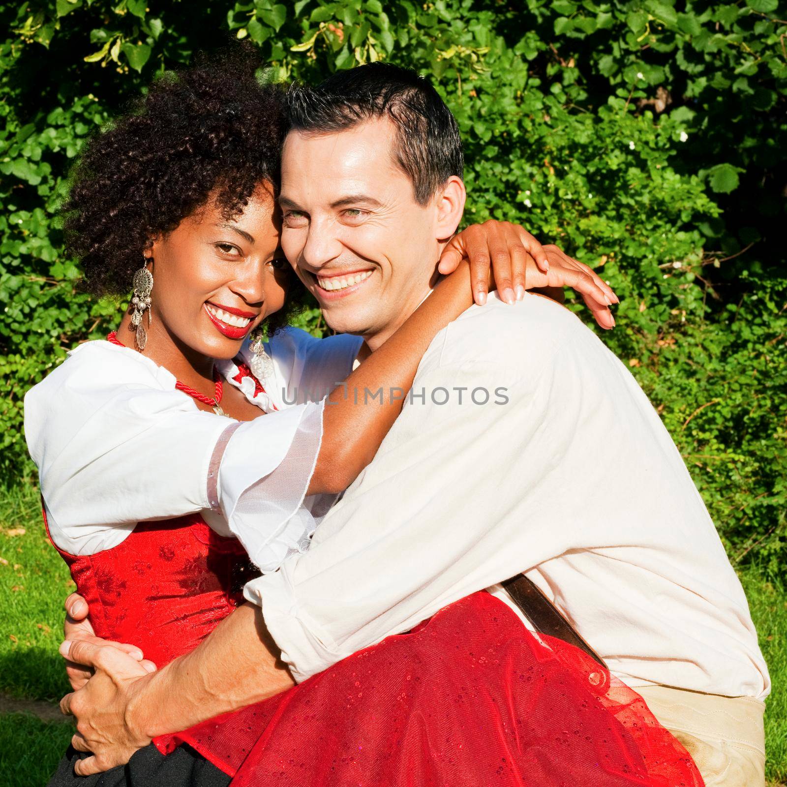 Couple in traditional Bavarian dress by Kzenon