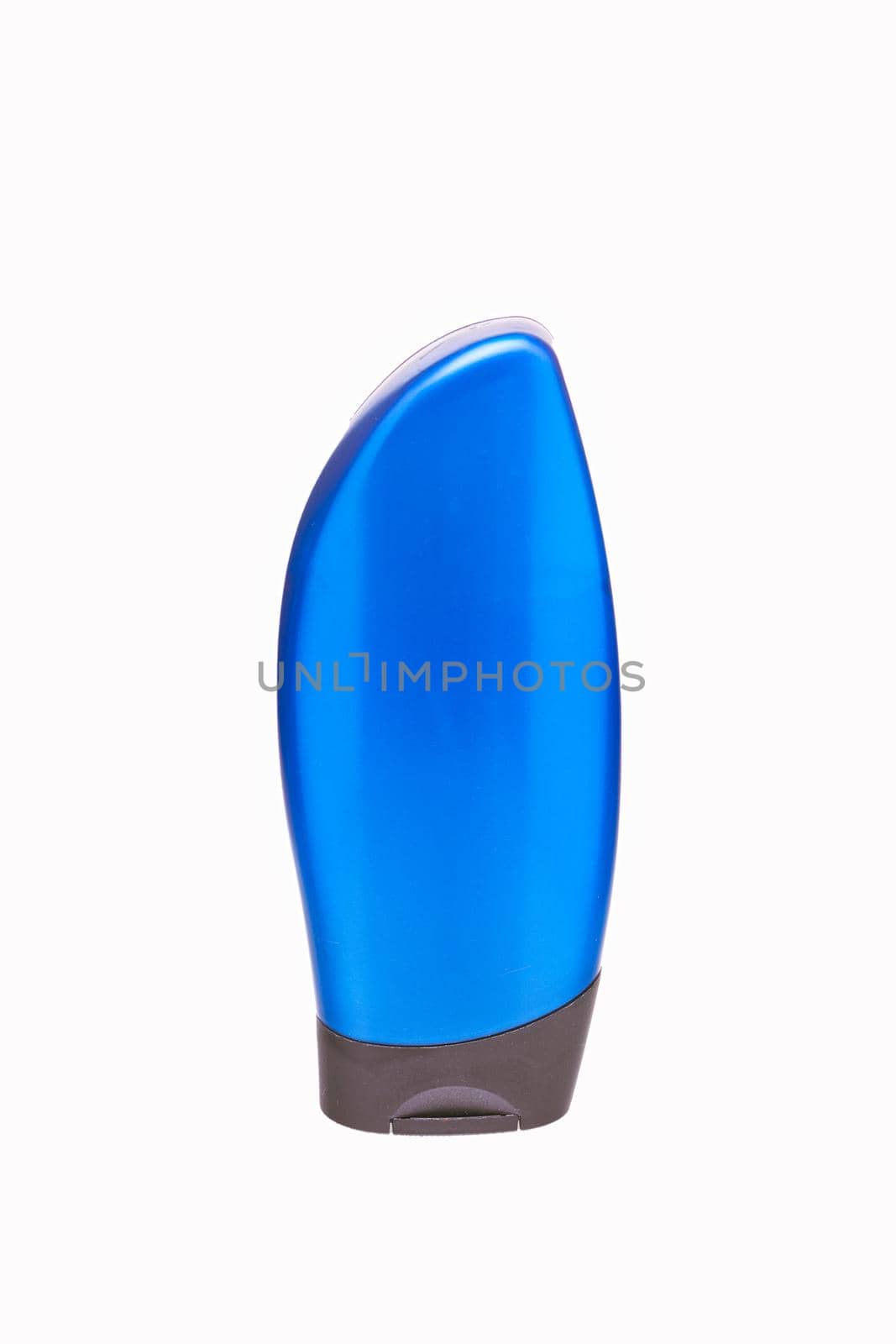 Blue plastic bottle on a white background, blank for design, place for text. Close up