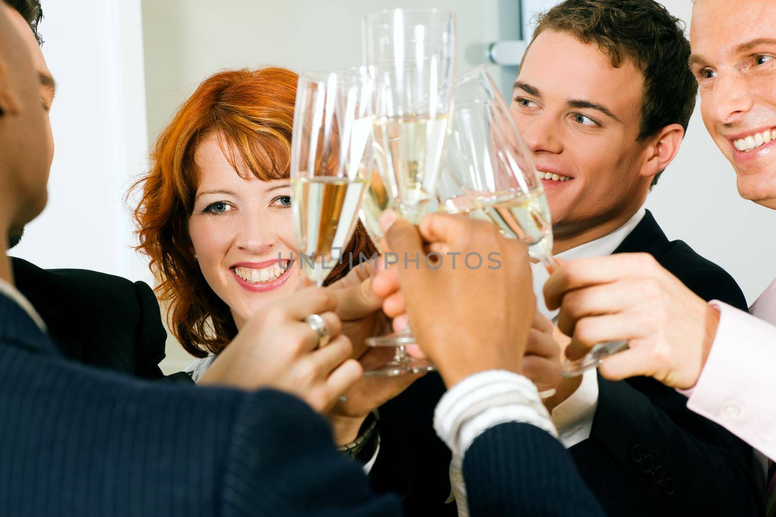 Group of people having a toast or party with champagne