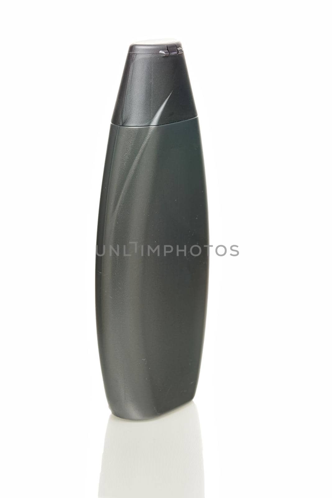 Gray plastic bottle on a white background, blank for design, place for text. Close up