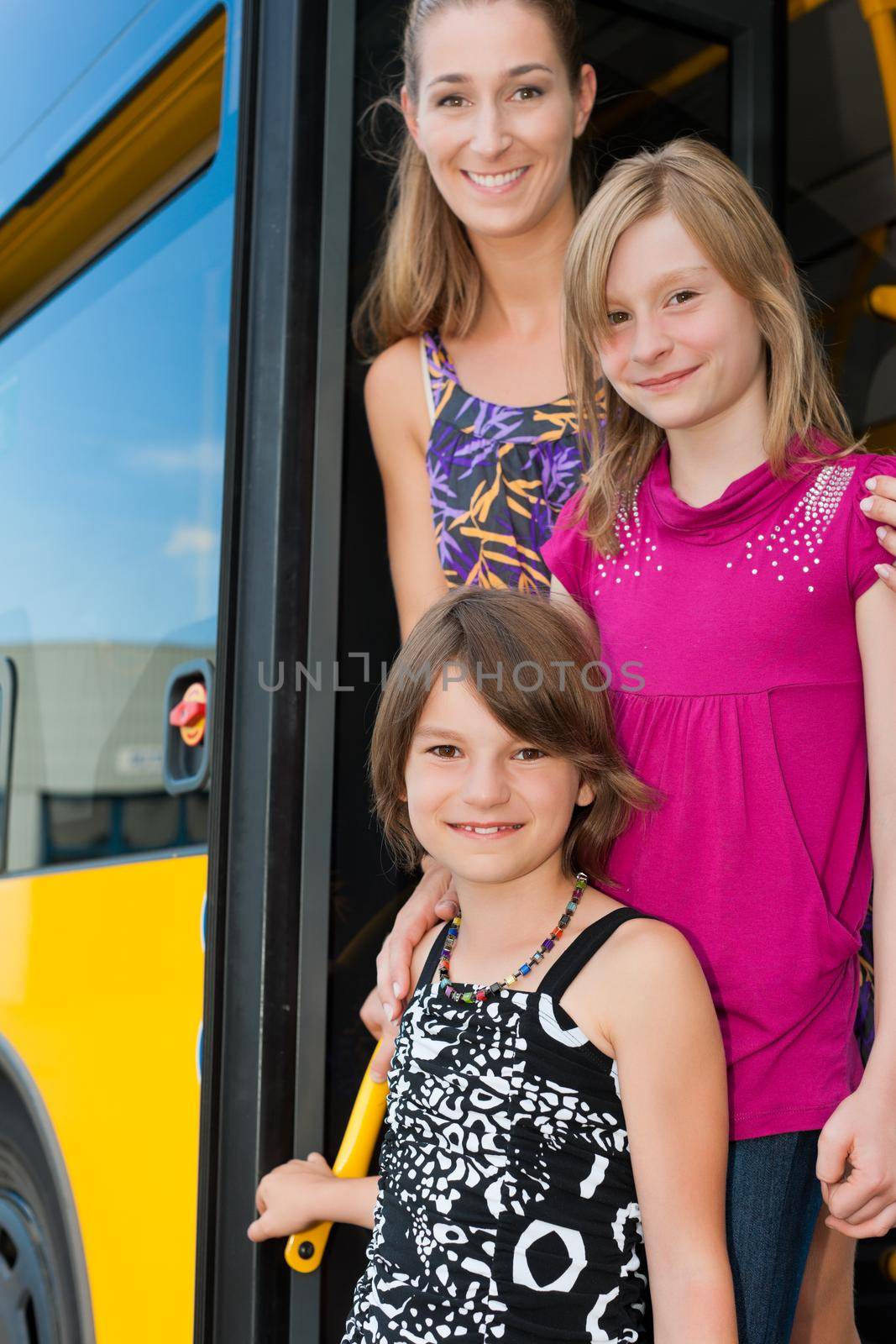 Mother and daughters looking out of a bus by Kzenon