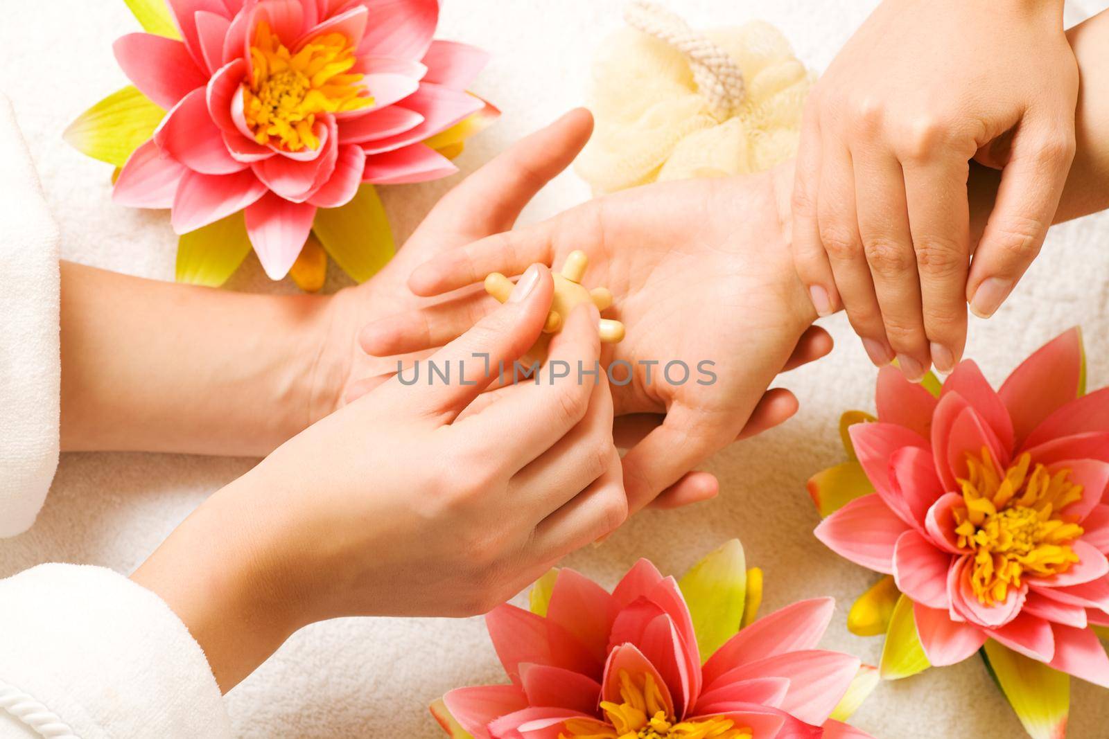 Woman getting a hand massage (close up on hands)