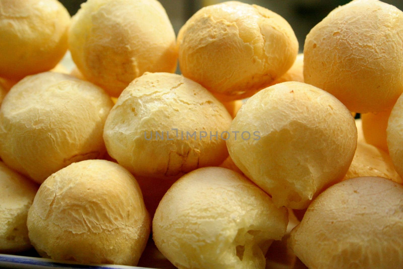 salvador, bahia / brazil - july 10, 2006: portion of cheese bread is seen in the city of Salvador.