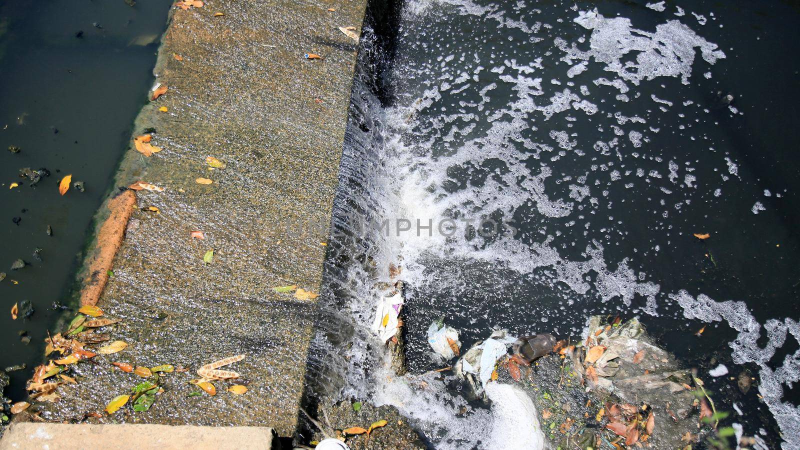 salvador, bahia, brazil - december 9, 2020: Open sewage channel is seen in the Lucaia region in the city of Salvador.