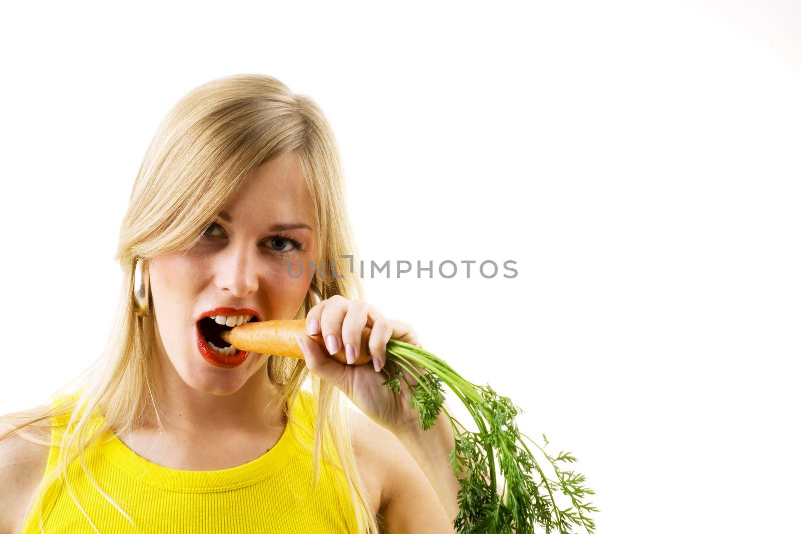Food and healthy nutrition - Woman in yellow eating healthy vegetables