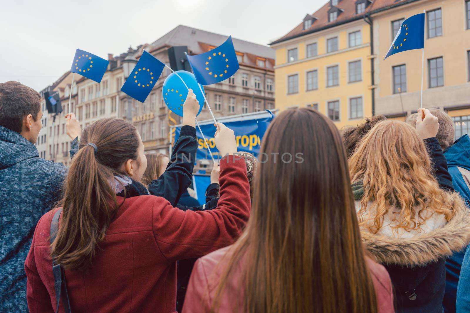 People on rally or demonstration supporting the EU waving flags