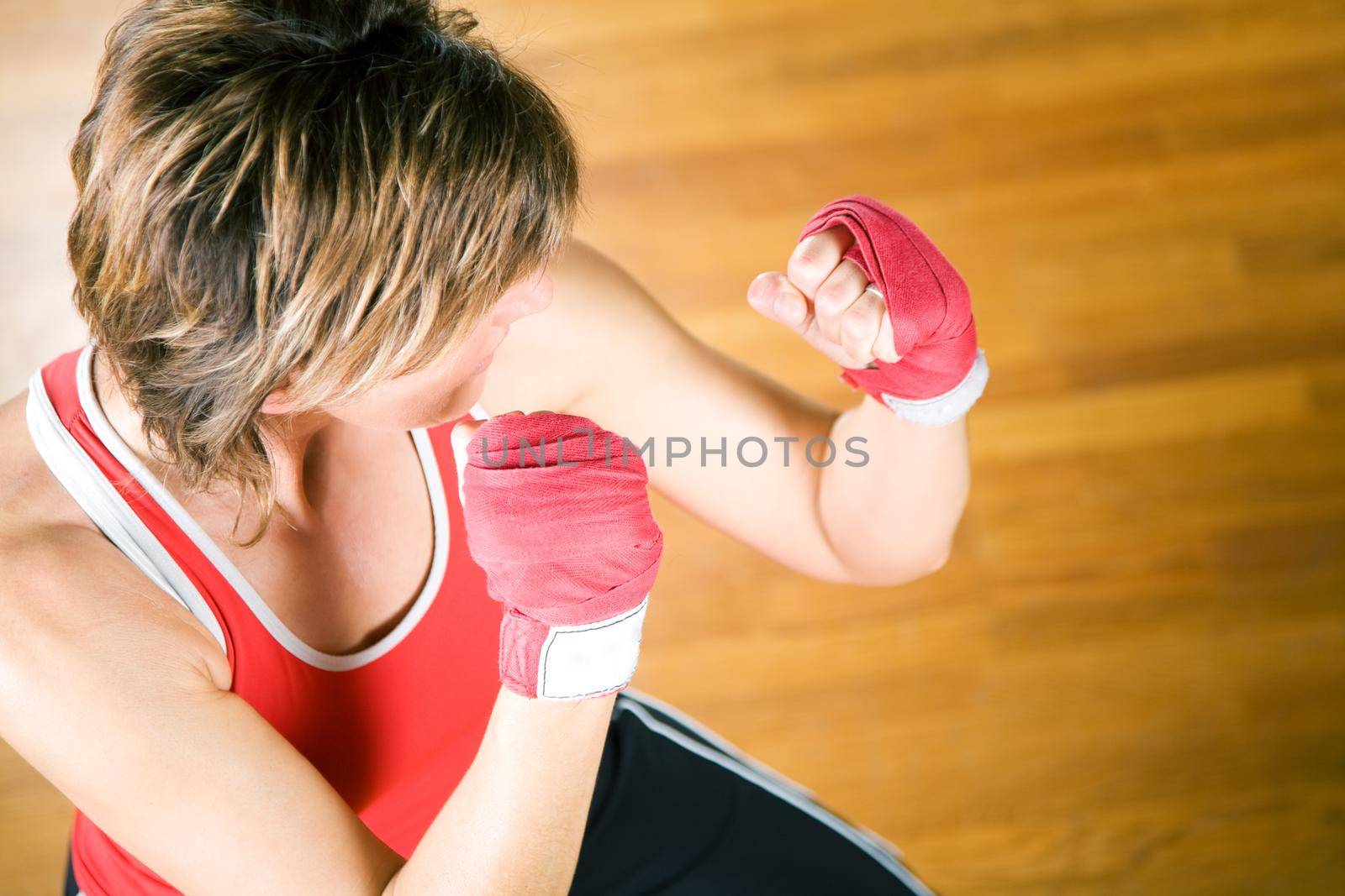 Sparring session in martial arts moves, couple exercising