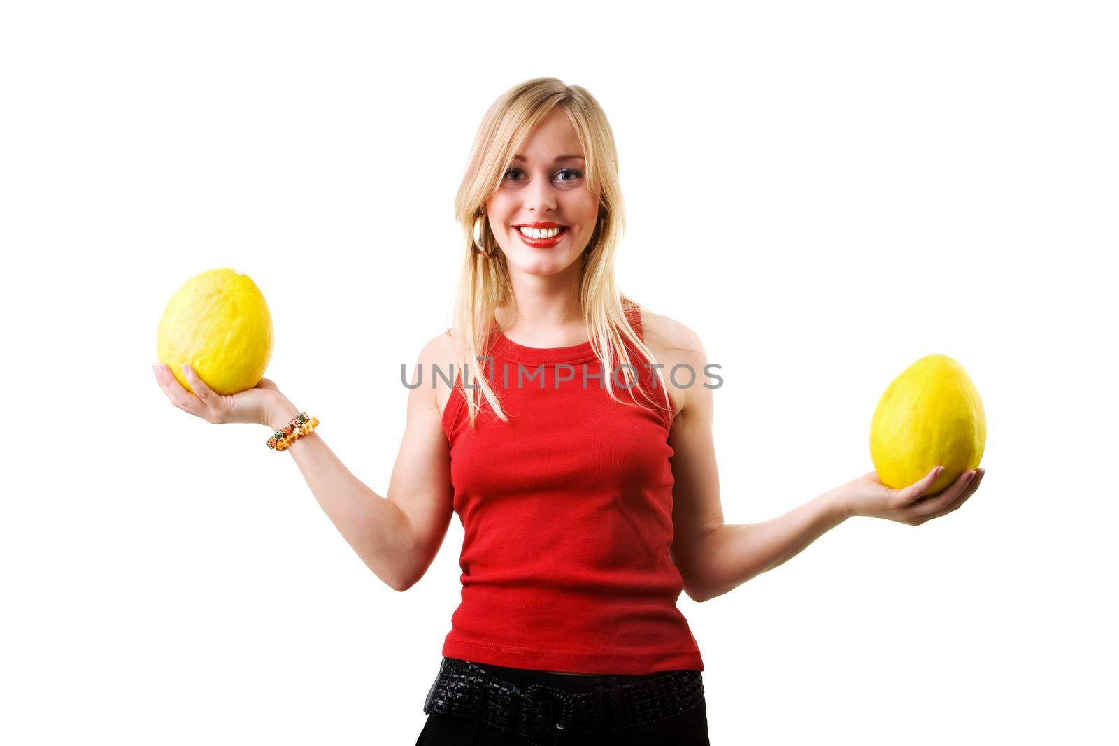 young woman holding honey melons