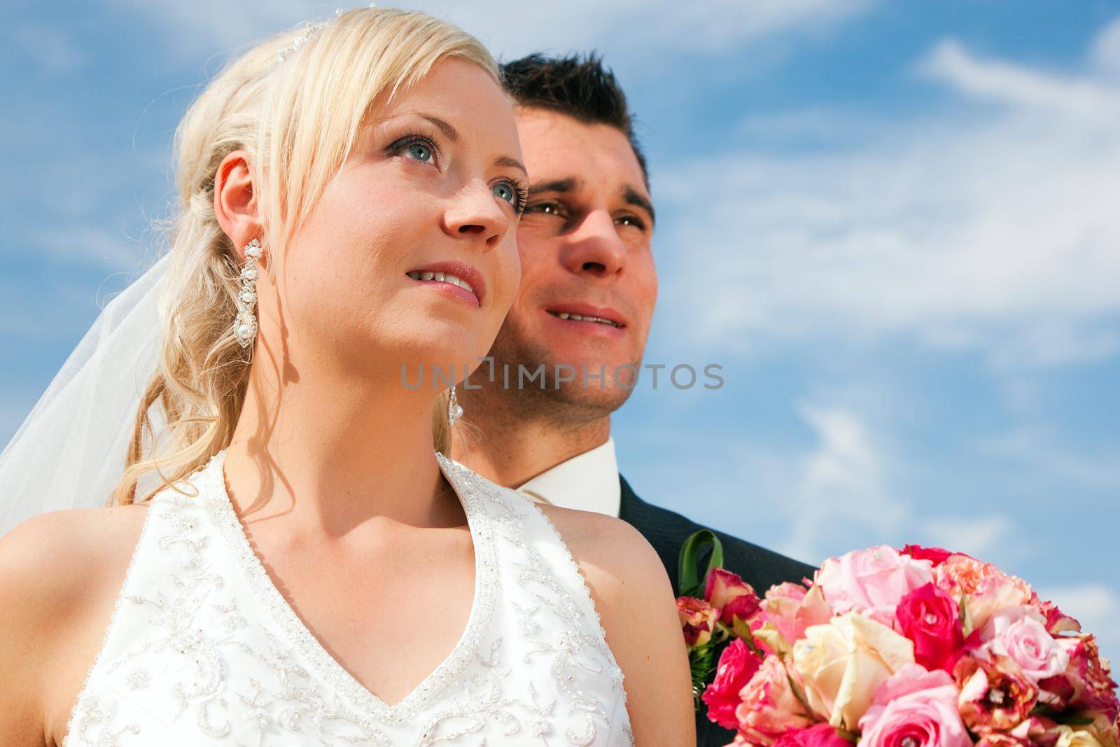 wedding couple looking forward into a bright future