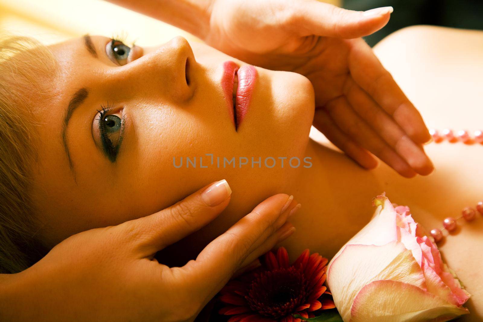 Beautiful woman enjoying a head massage