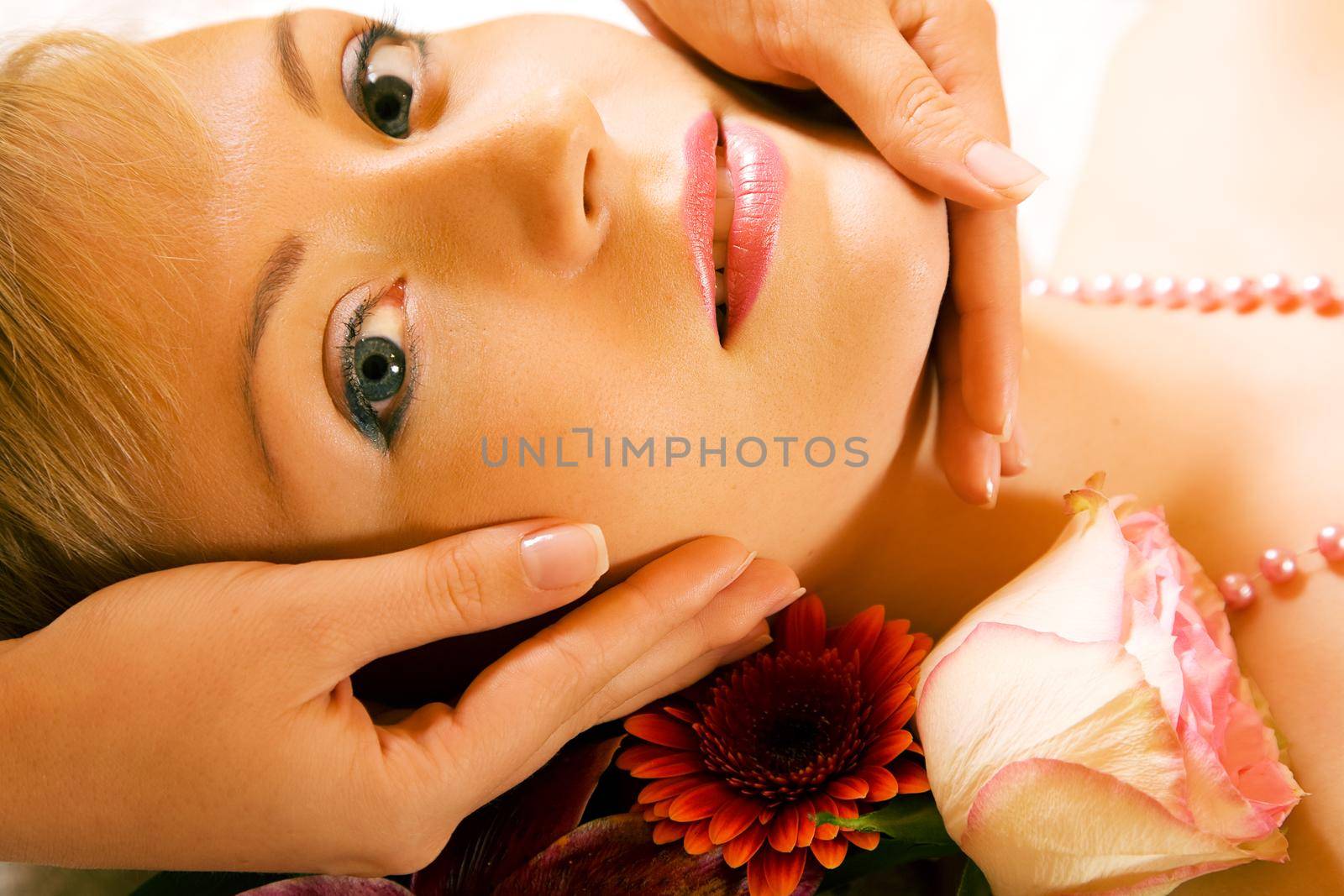Beautiful woman enjoying a head massage
