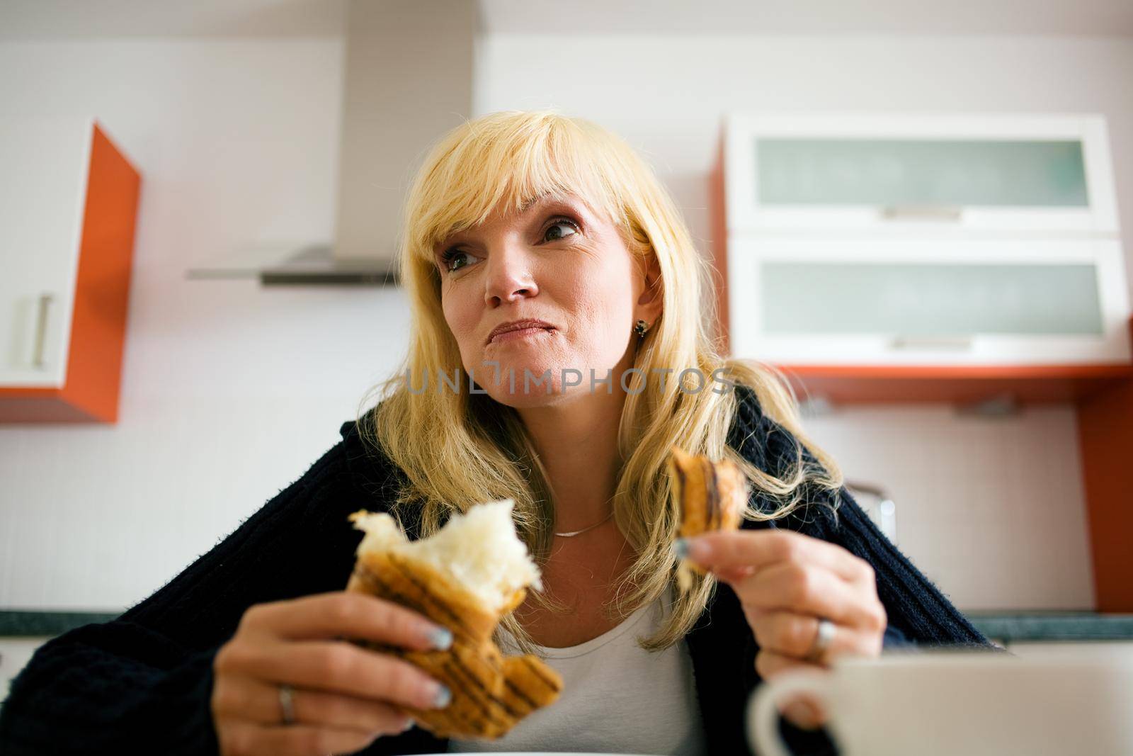 Woman having breakfast by Kzenon