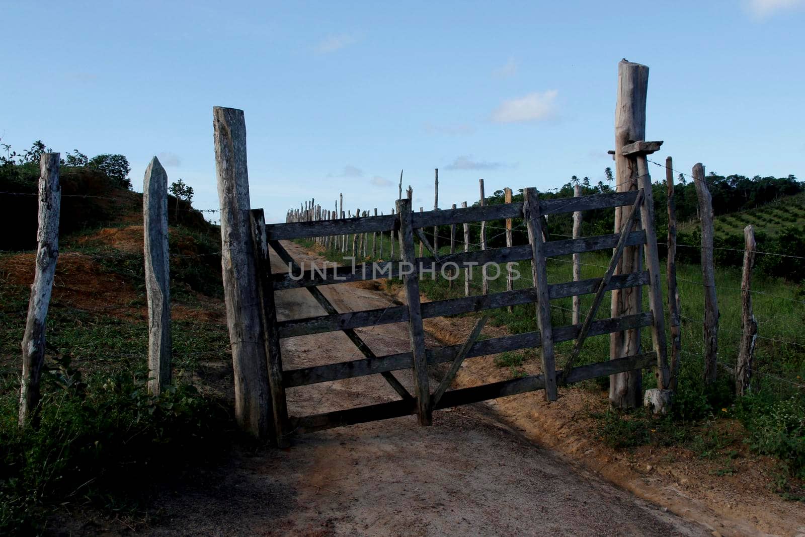 conde, bahia / brazil - september 7, 2012: the farm gate is seen in a rural area in the city of Conde.