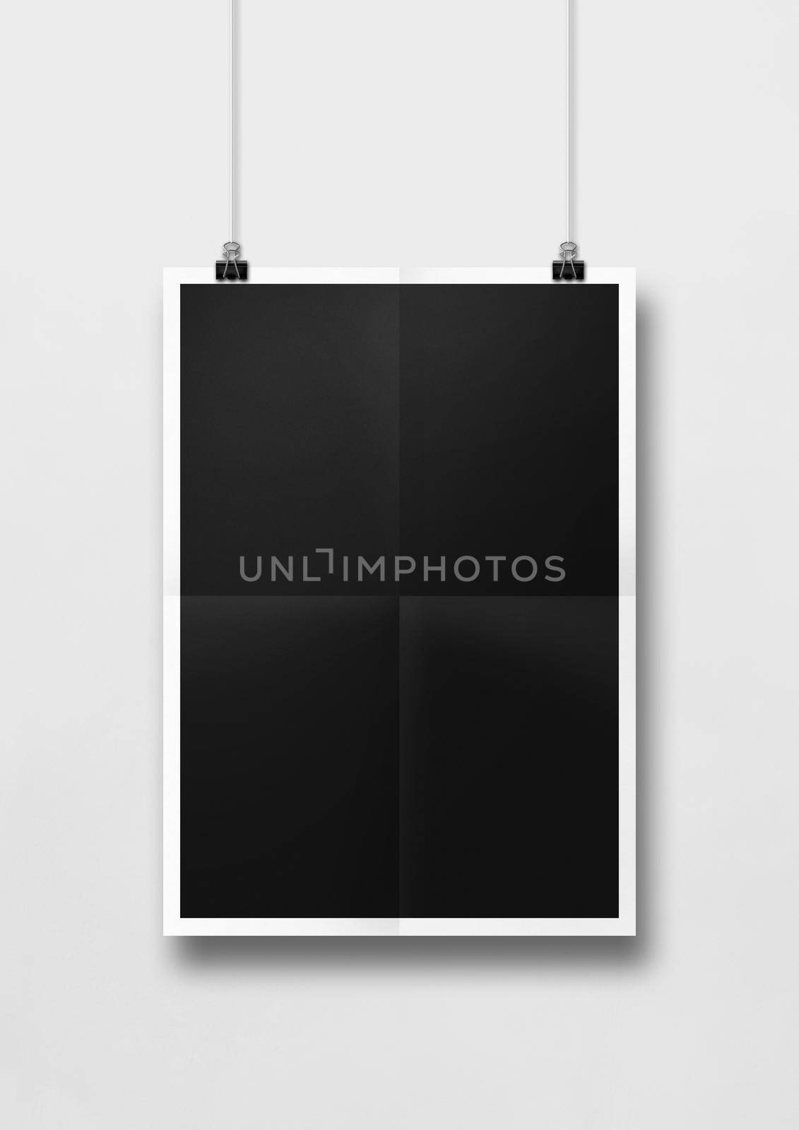 Black folded poster hanging on a white wall with clips. Blank mockup template