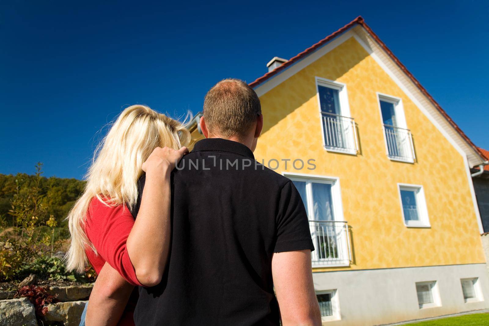 Young couple dreaming of a new home