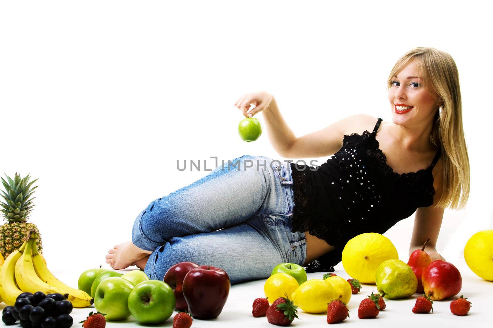 Food, fruit and healthy nutrition - Green apple on the hip of a beautiful blond girl
