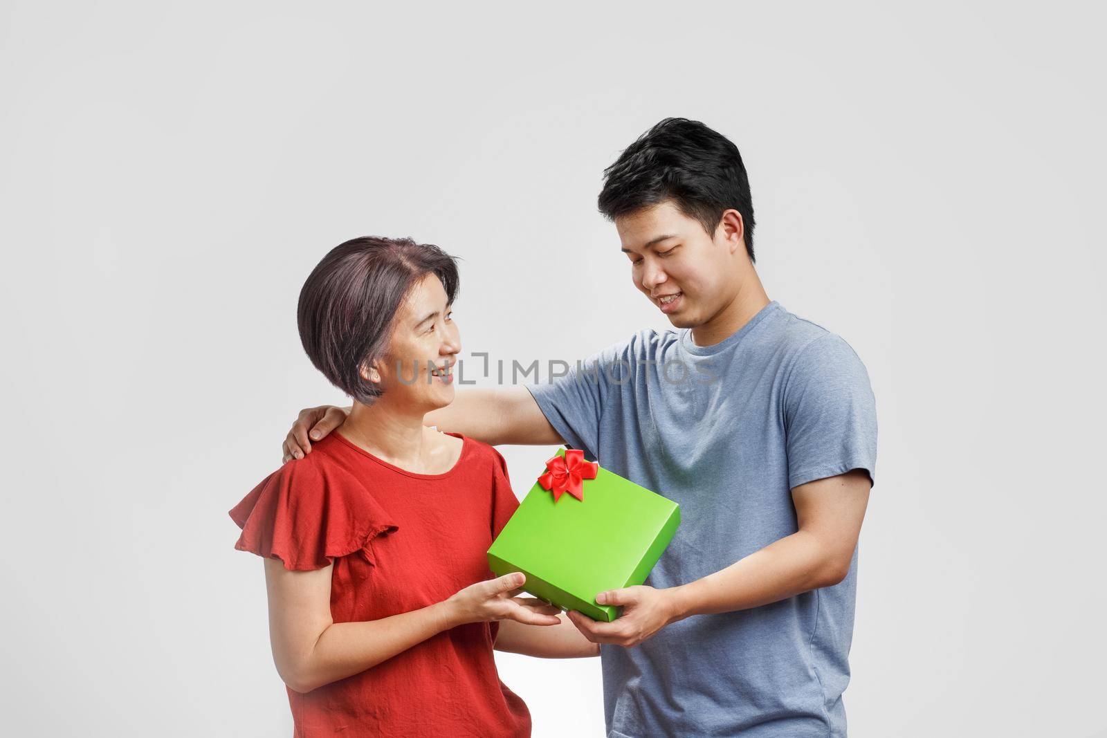 Mother day, mom receiving a gift from son by toa55