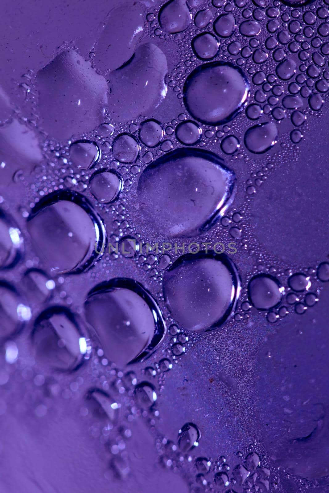 Macro shooting of water droplets beside the glass surface close up liquid drops modern background pattern high quality prints