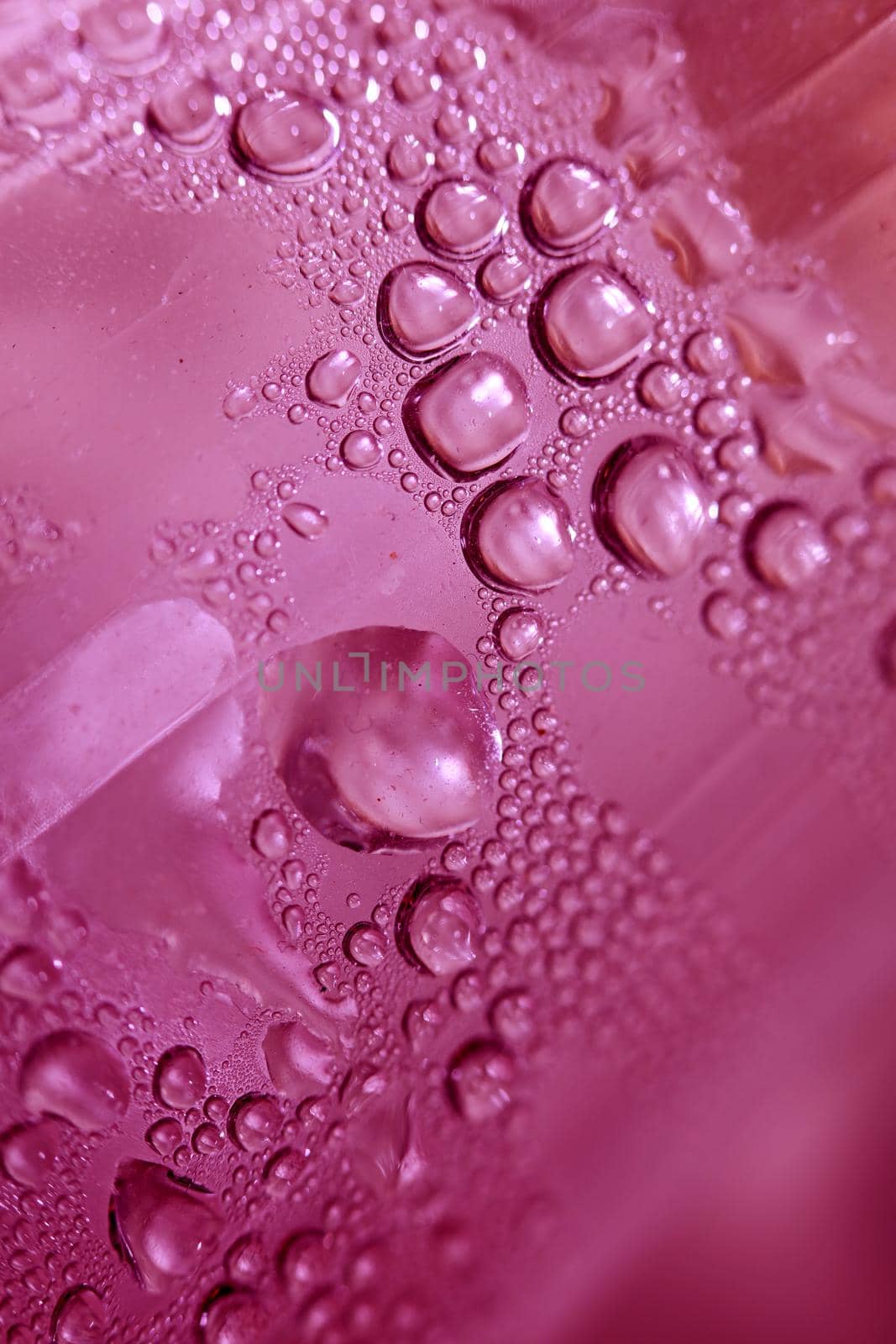 Macro shooting of water droplets beside the glass surface close up liquid drops modern background pattern high quality prints