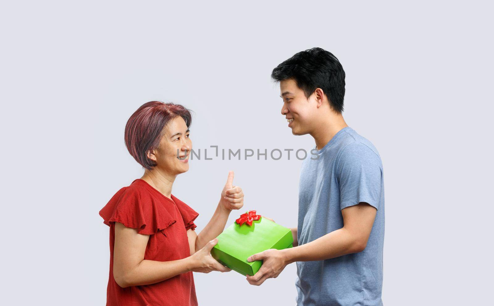 Mother day, mom receiving a gift from son by toa55