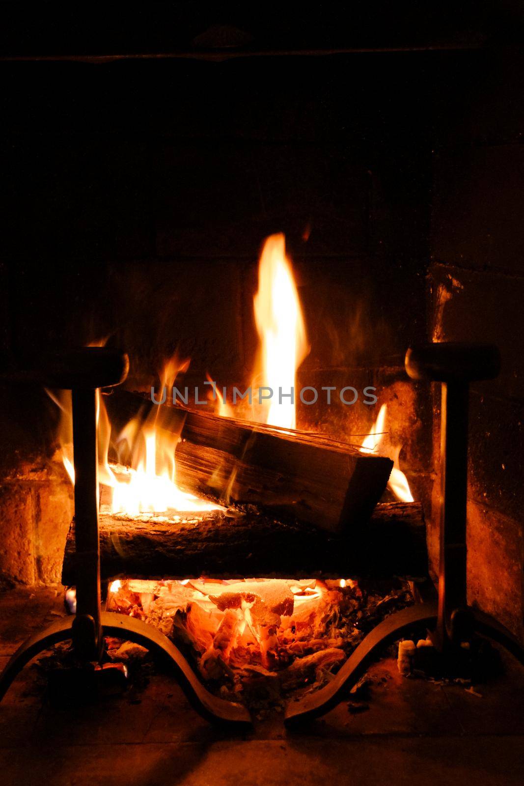 Fireplace close-up interior view at night. Abstract background
