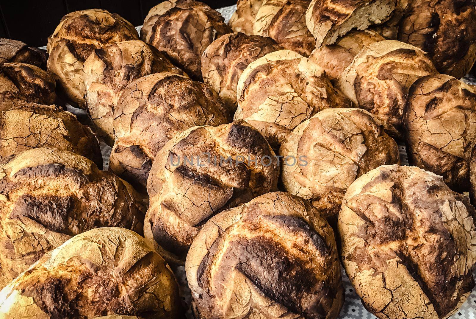 Loaves of traditional country bread by daboost