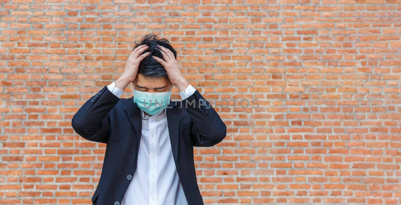 Business man in distress of job losses due to COVID-19 virus pandemic by toa55