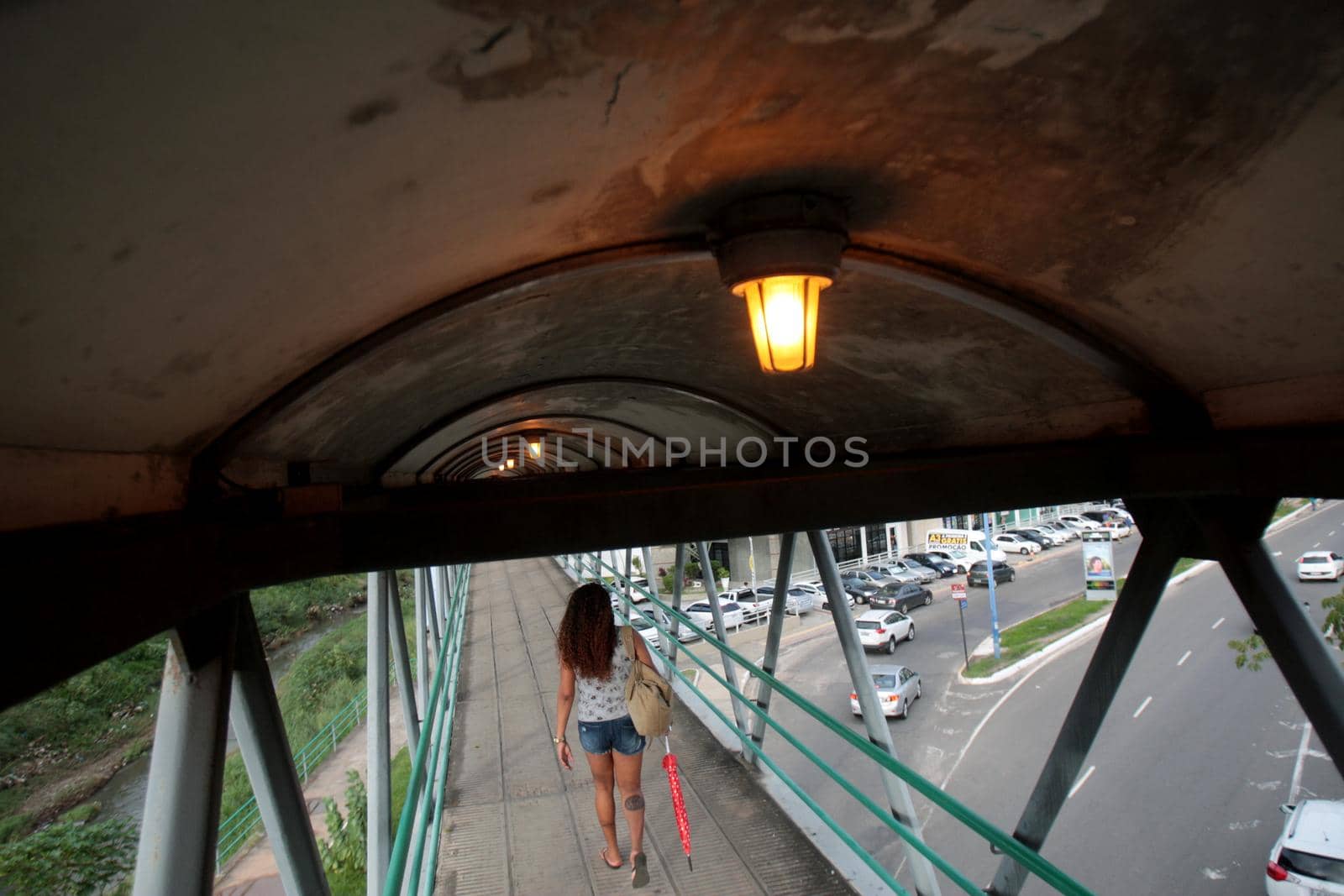 salvador, bahia / brazil - april 20, 2017: light on is seen on a walkway on Avenida Tancredo Neves in the city of Salvador.