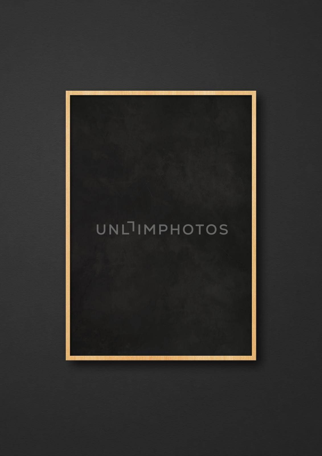 Traditional blackboard isolated on a black background. Blank vertical mockup template
