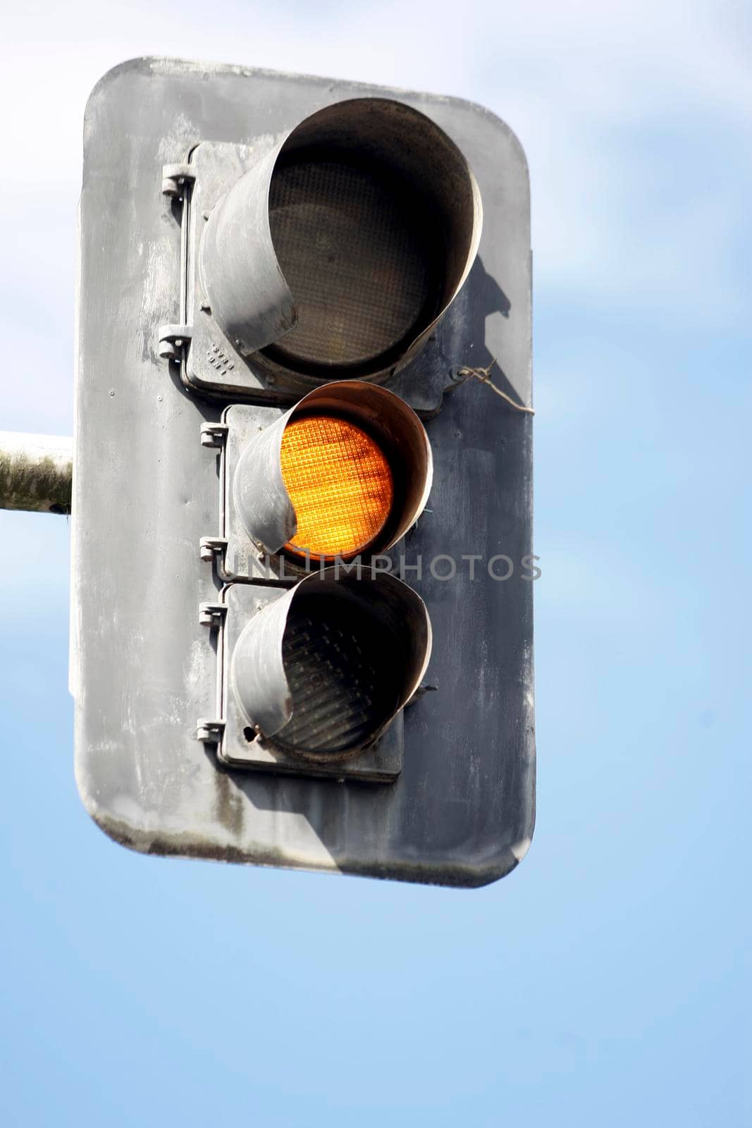 salvador, bahia / brazil - july 11, 2018: semafor is seen with yellow light on in the city of Salvador.

