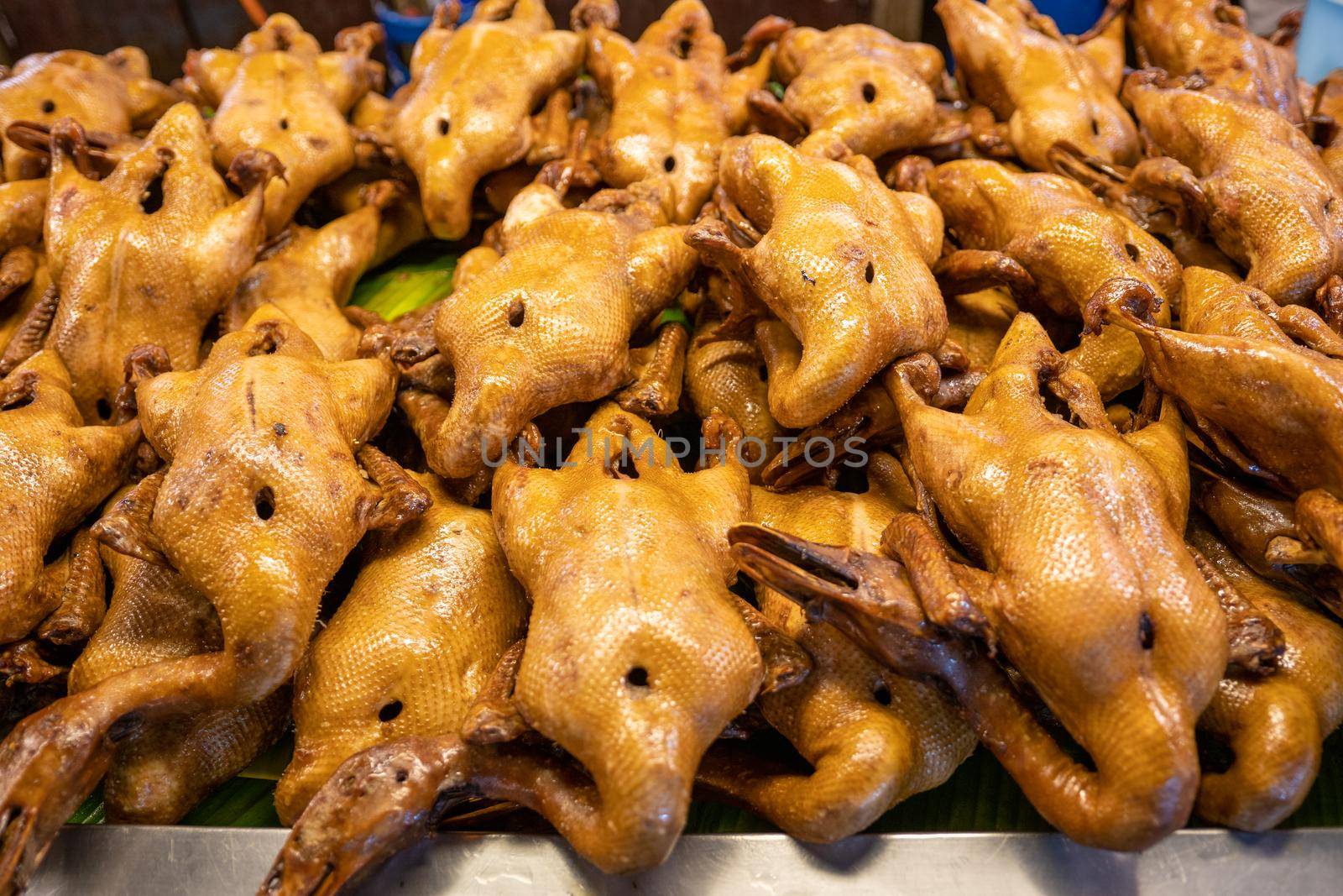 Chinese New Year's Eve : duckling or pot-stewed duck and boiled chicken on sales at market for chinese new year festival.