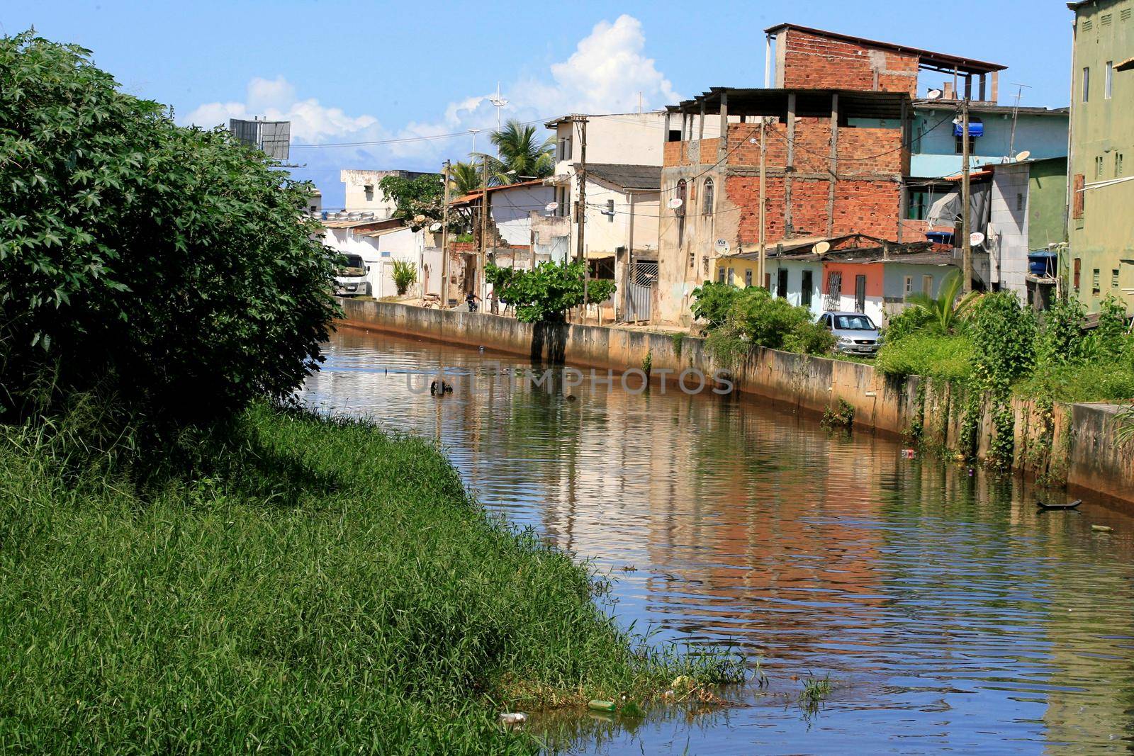 salvador, bahia / brazil  - april 24, 2014: View of the Camurugi River. The river receives domestic and industrial sewage from the city of Salvador.