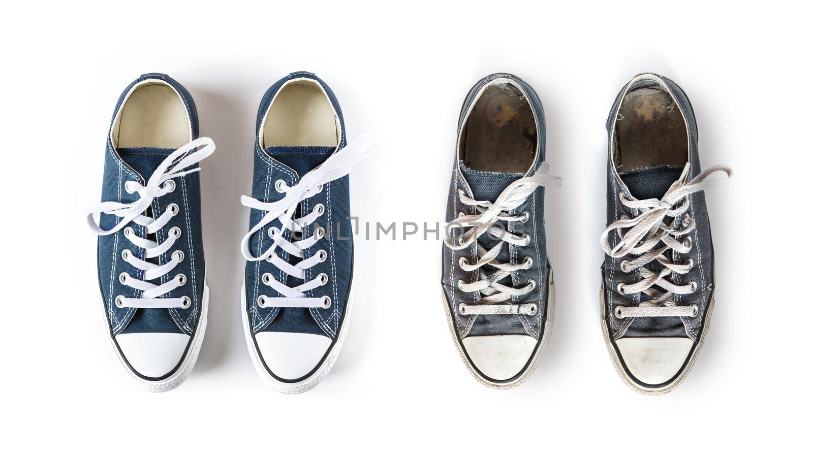 New and old blue sneakers isolated on white background by daboost