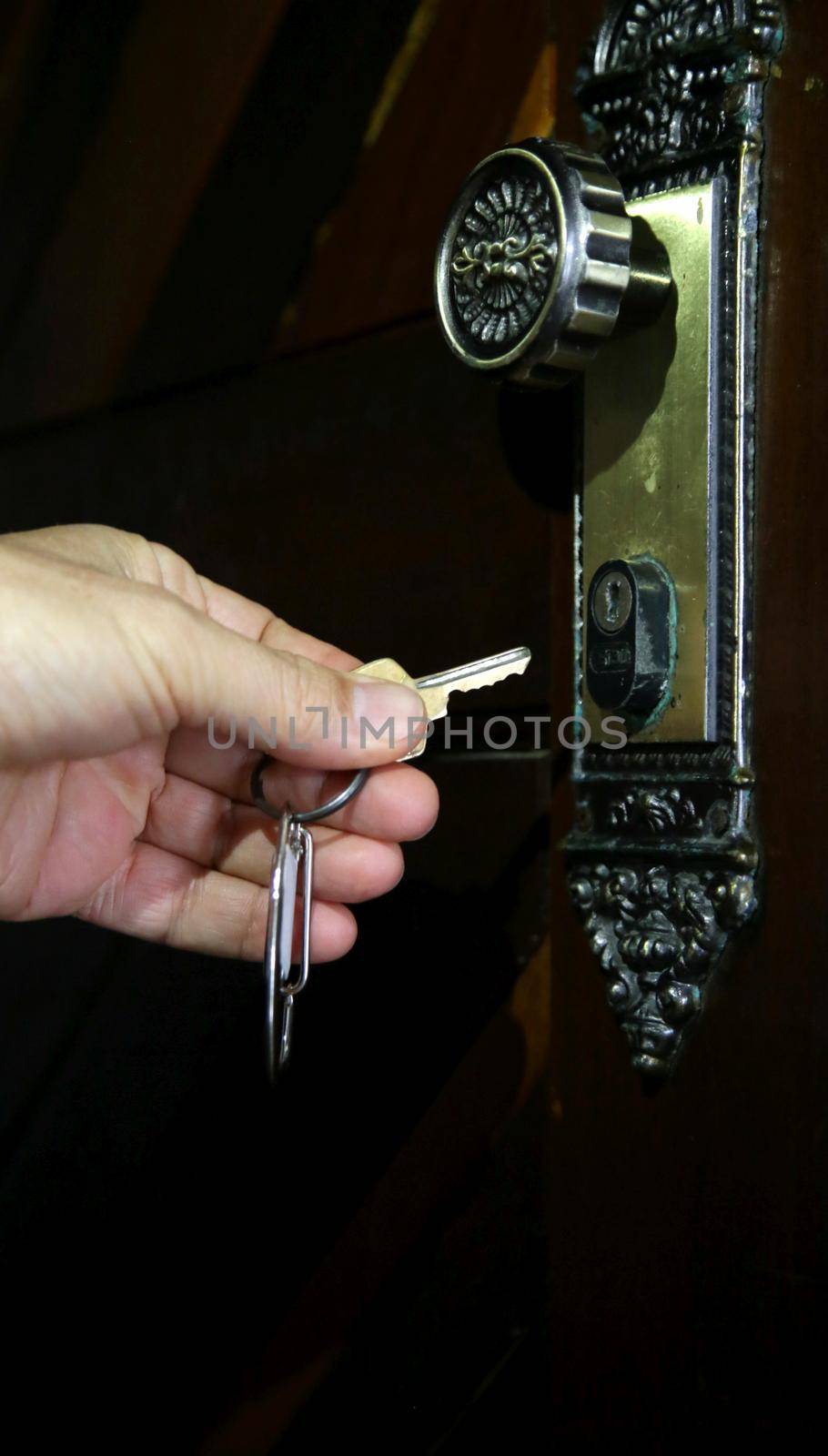 salvador, bahia brazil - may 26, 2020: key is seen next to the apartemnto door lock in the city of Salvador.