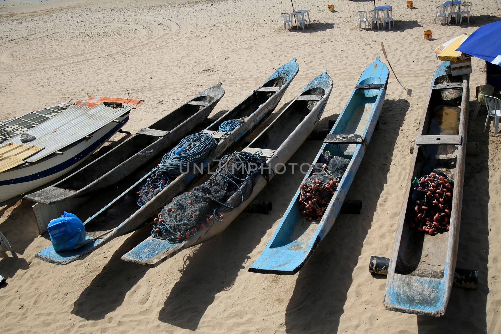 salvador, bahia, brazil - december 21, 2020: canoes used by fishermen in artisanal fishing on Itapua beach, in the city of Salvador.