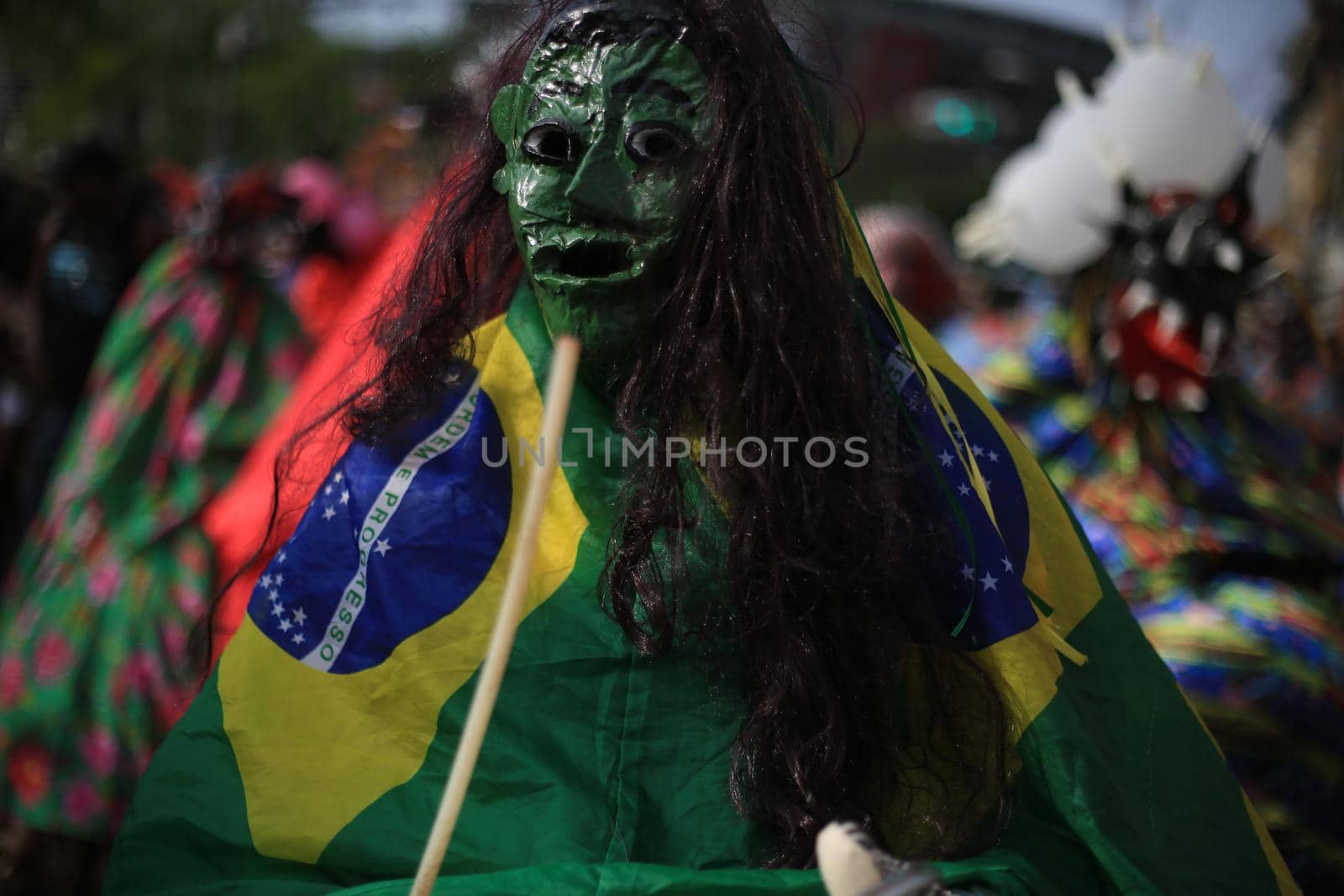 salvador, bahia / brazil - january 24, 2016: Members of the cultural group Caretas from Praia do Forte, are seen during a presentation at the Tororo Dike in Salvador.