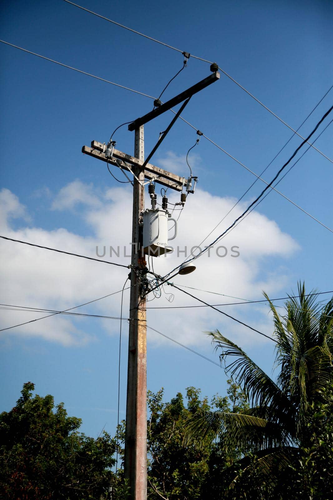 mata de sao joao, bahia / brazil - october 25, 2020: electric power transformer is seen on a pole in the rural area of the city of Mata de Sao Joao.