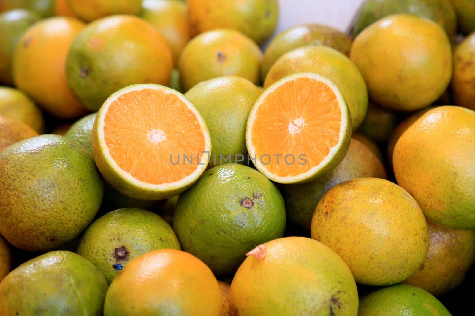 salvador, bahia, brazil - january 27, 2021: orange fruits are seen for sale at the fair in japan, in the Liberdade neighborhood in the city of Salvador.
