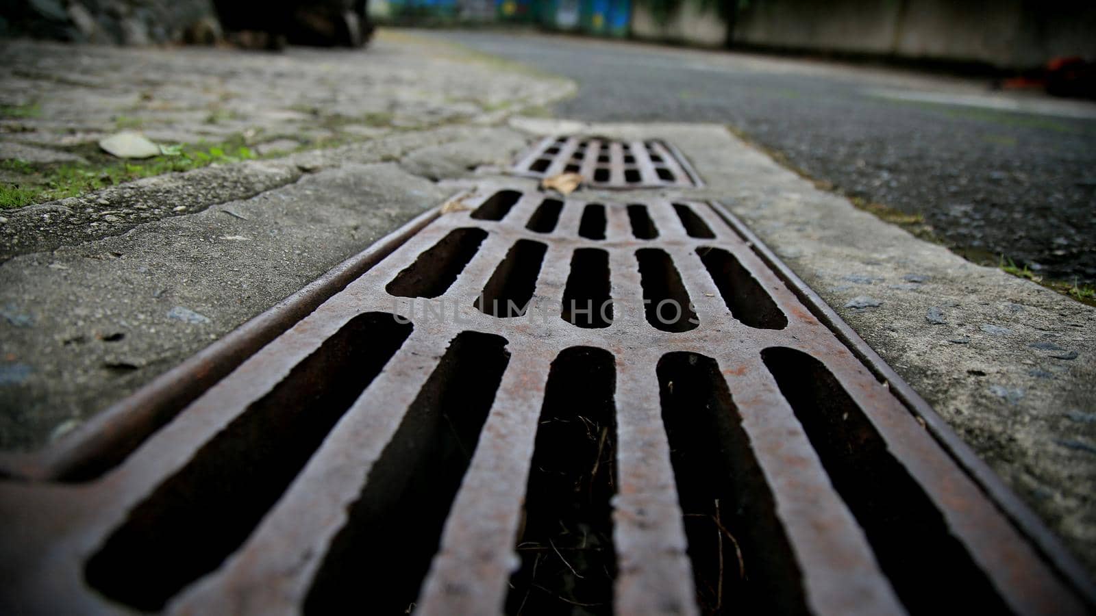 salvador, bahia / brazil - june 27, 2020: manhole grating for rainwater drainage is seen in a condominium in the city of Salvador.