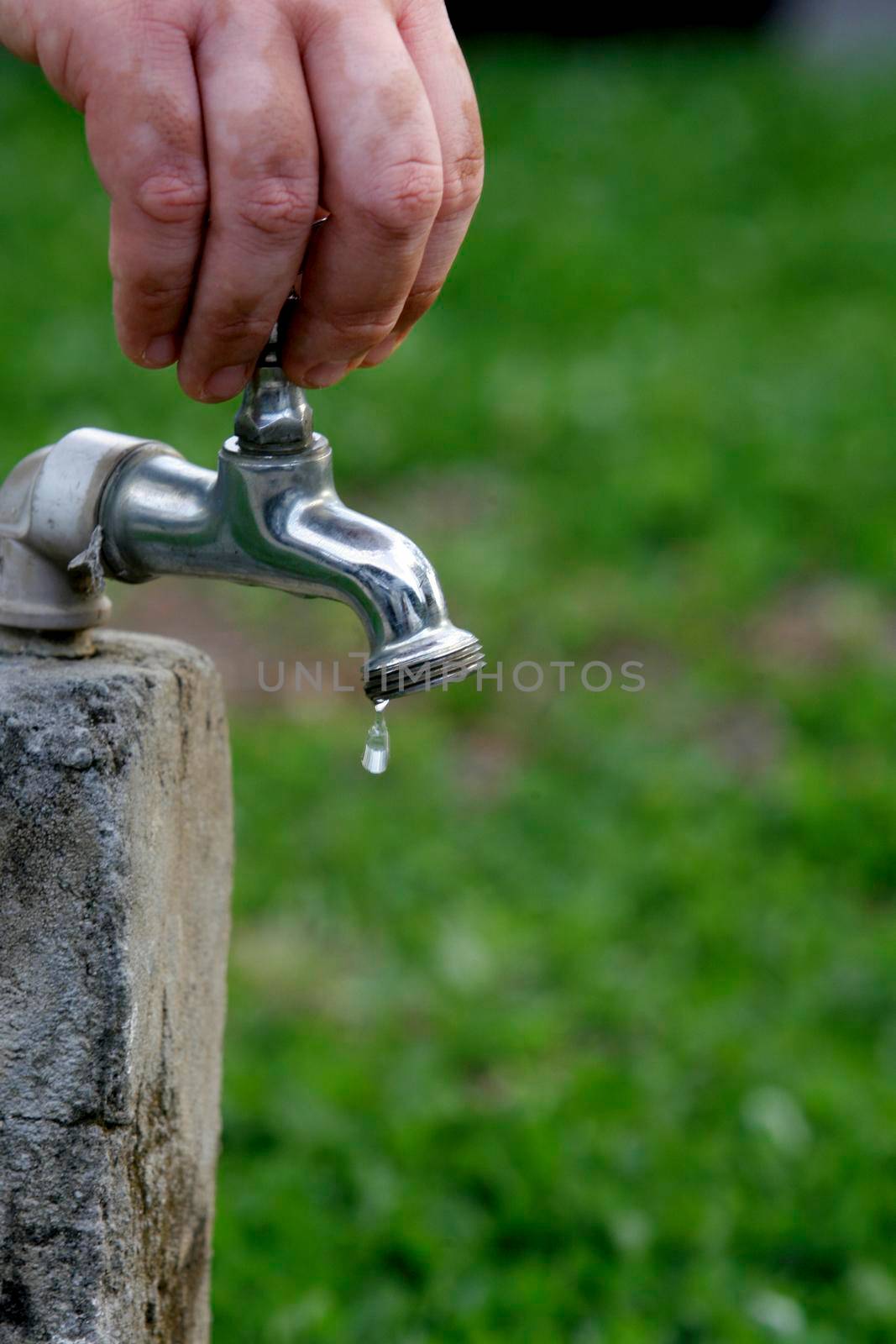 salvador, bahia / brazil - november 9, 2013: leaky faucet is seen in the city of Salvador.