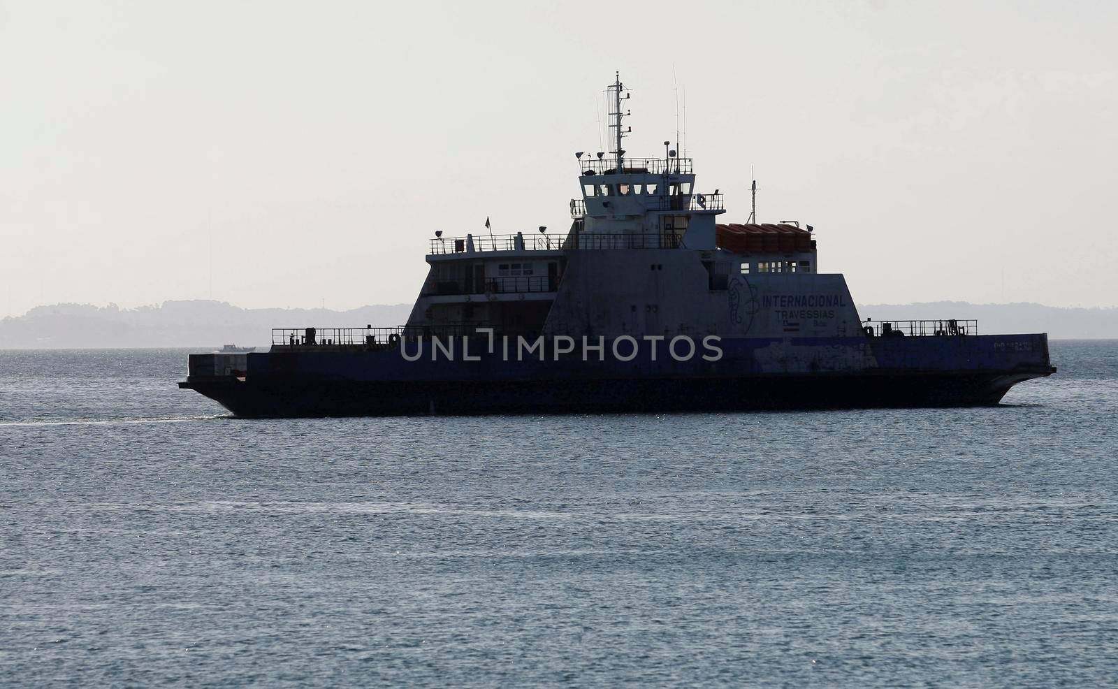 salvador, bahia / brazil - october 26, 2016: Ferry boat Rio Paraguacu is seen standing in Todos os Santos Bay, near the Sao Joaquim Terminal in the city of Salvador.