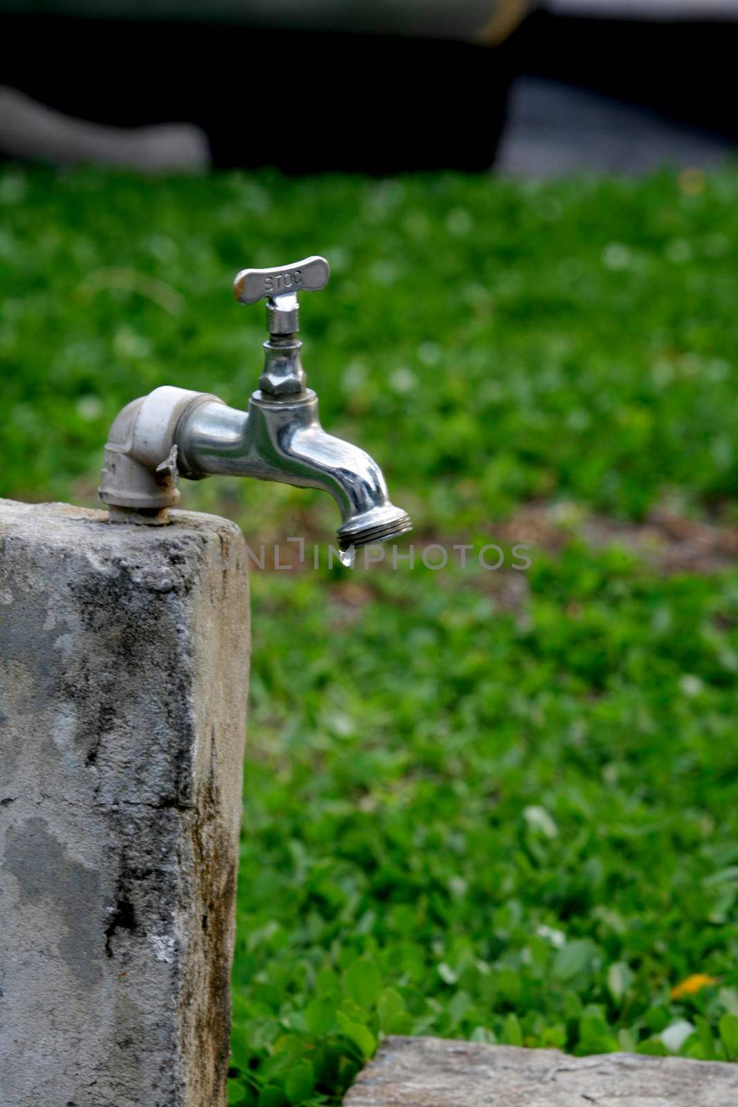 salvador, bahia / brazil - november 9, 2013: leaky faucet is seen in the city of Salvador.