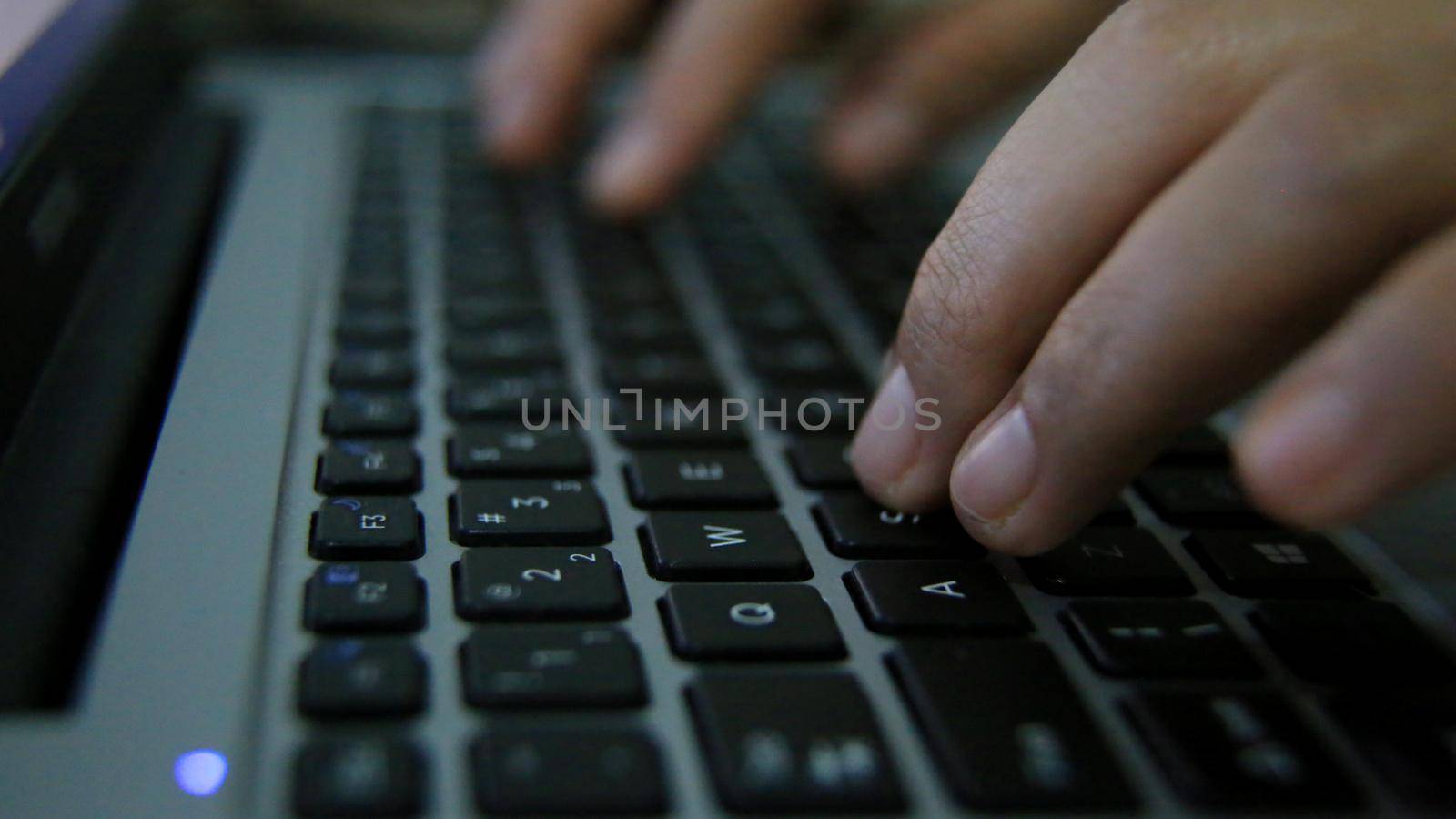 salvador, bahia / brazil: 03/30/2020: person uses computer keyboard to access the internet